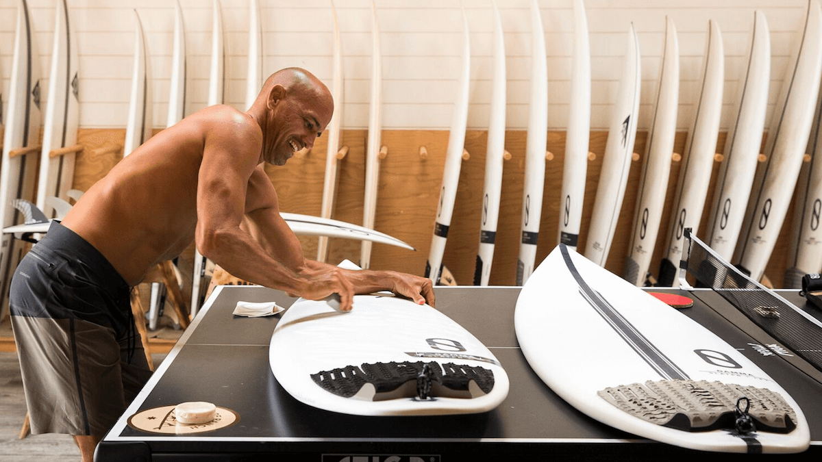 Kelly Slater waxing up the Helium & LFT Gamma before a session at the Surf Ranch